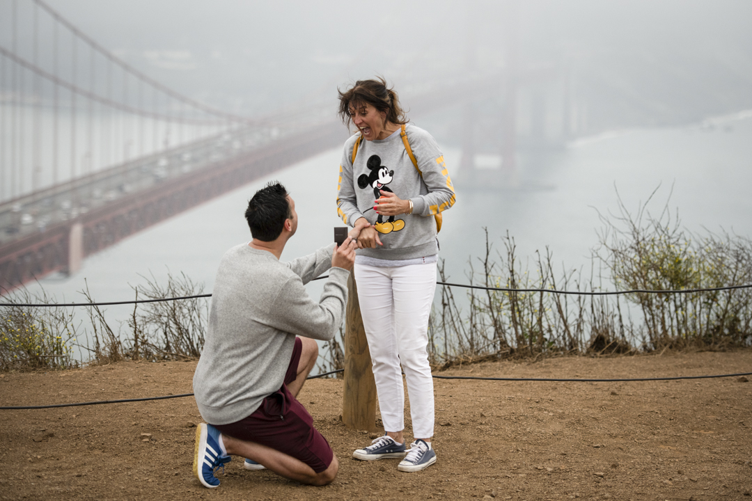 Rich proposing to Catherine at a clifftop overlook